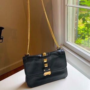 Saks Black leather studded bag
